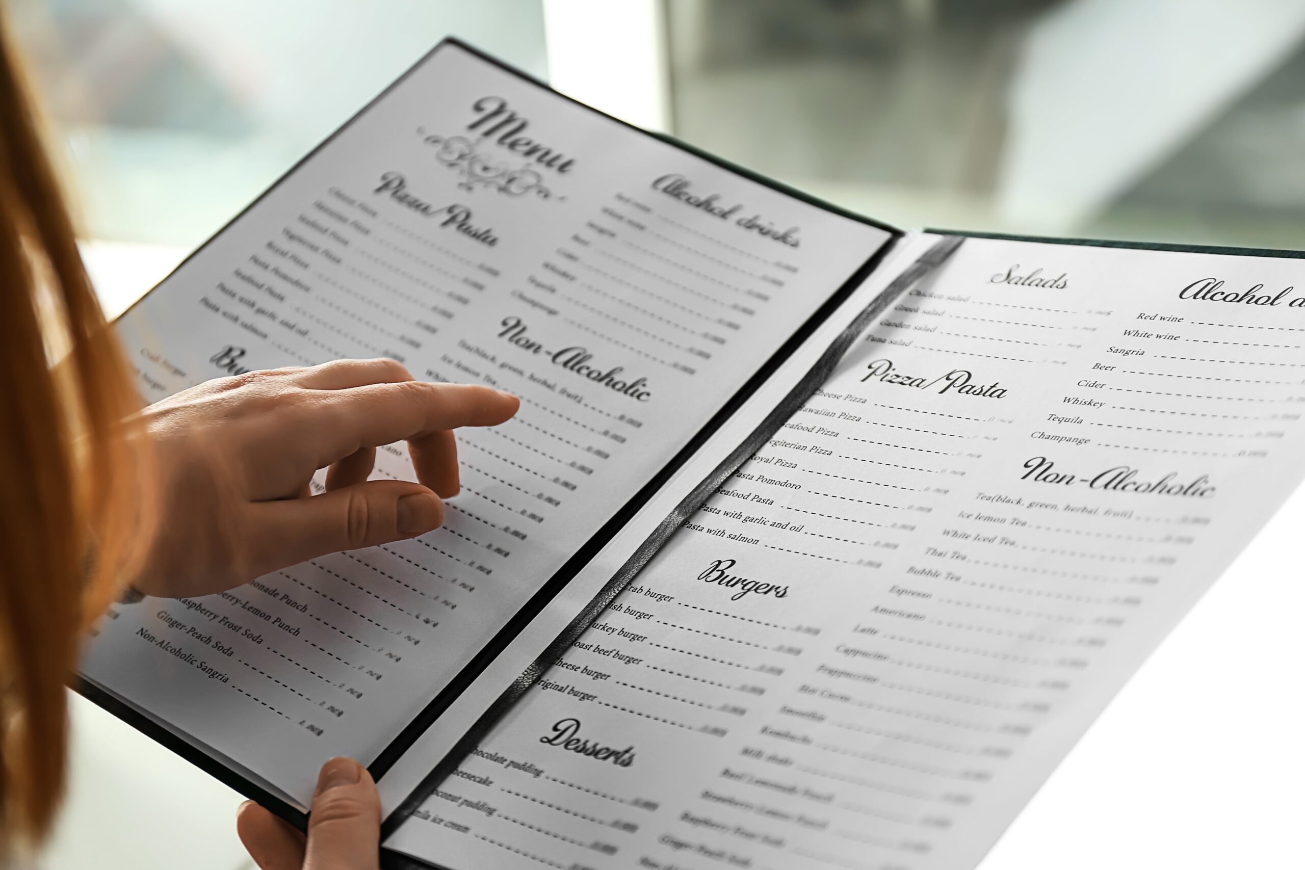A sleek, minimalist restaurant menu layout featuring dishes that reflect trends.