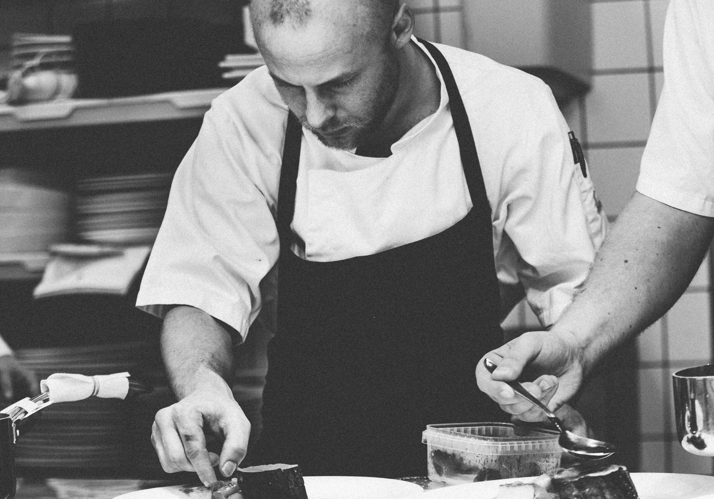 Restaurant executive chef preparing a gourmet meal casual dining gecko hospiality